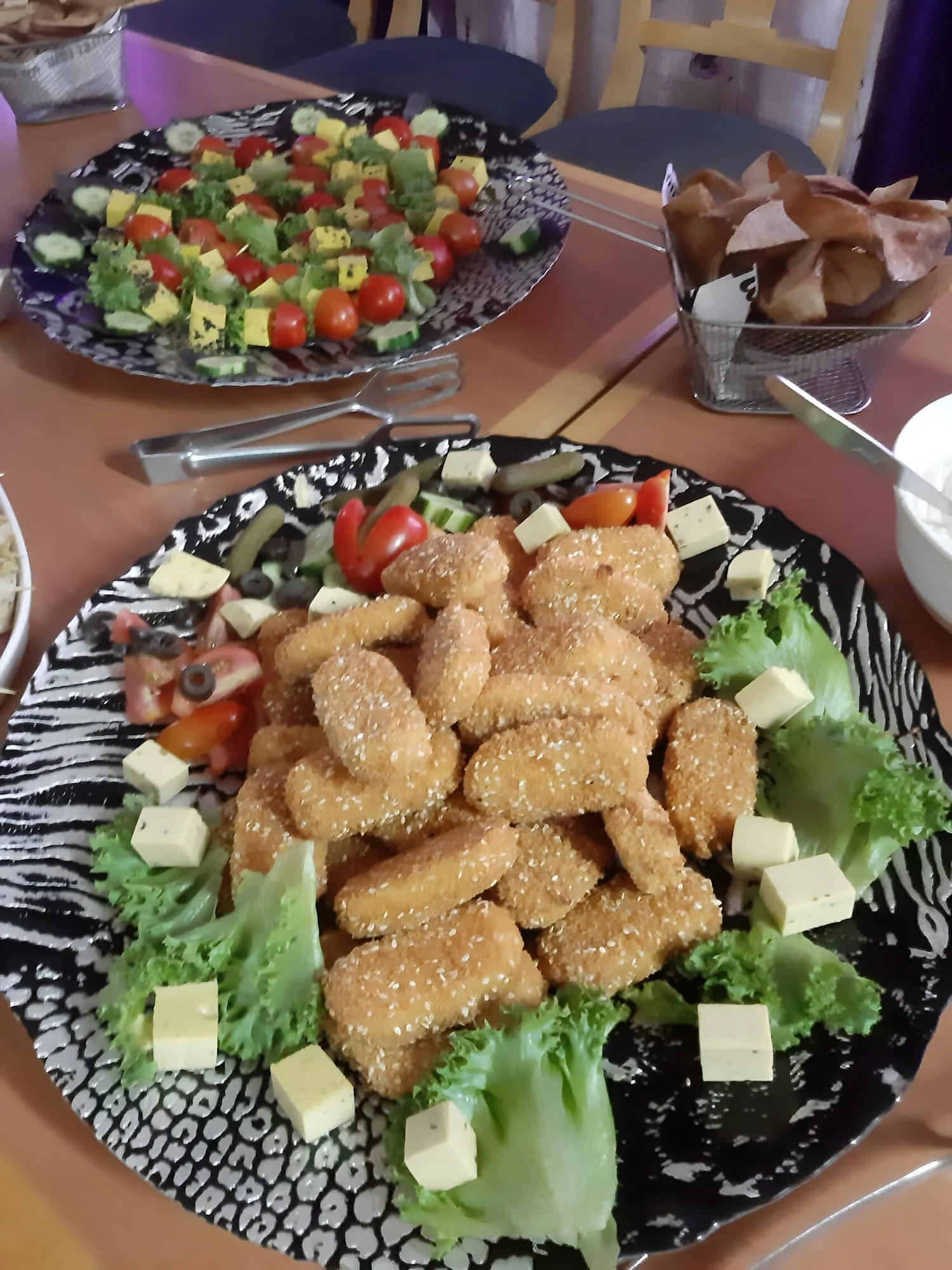 Breaded plant-based platter prepared for a community gathering