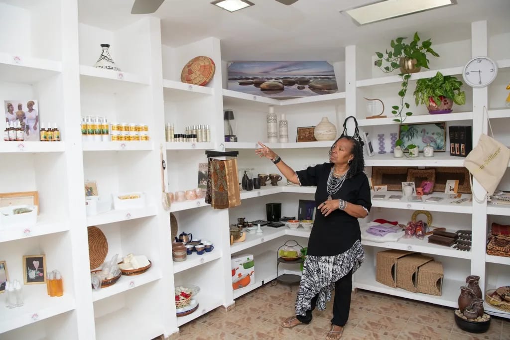 Shelves of community-made Village of Peace marketplace products