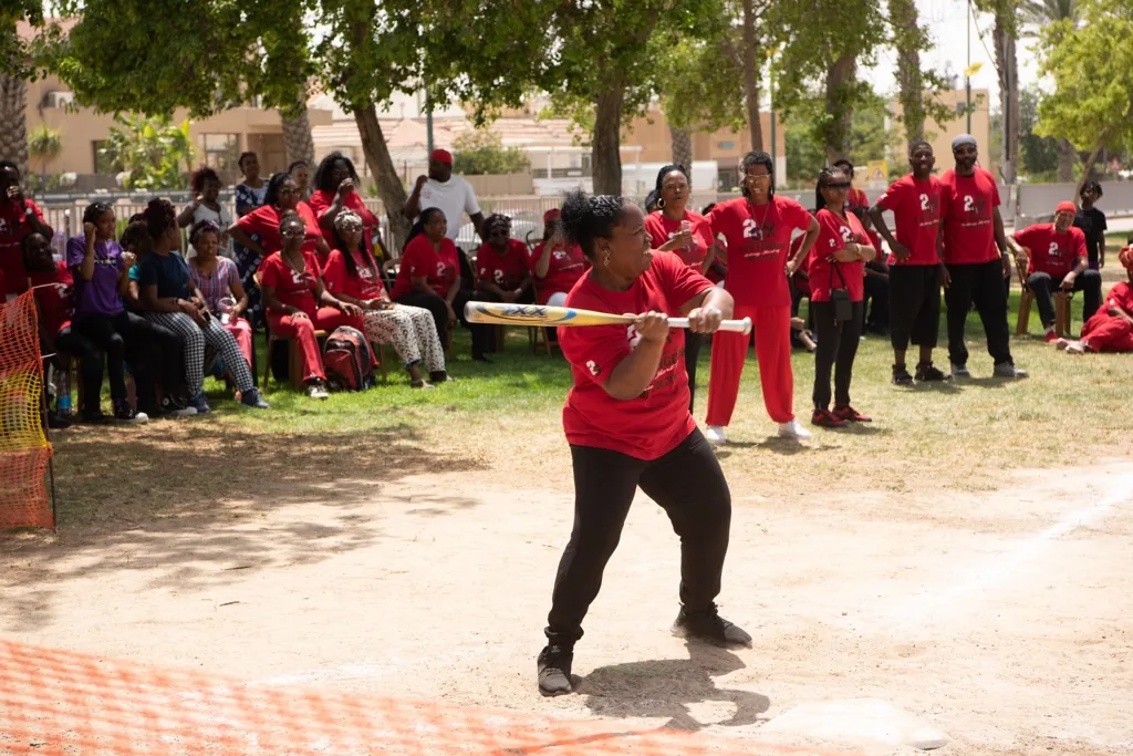 Young performers dancing outdoors during a community celebration